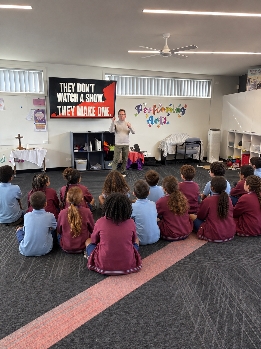 Jon Bode speaking to primary students during an incursion