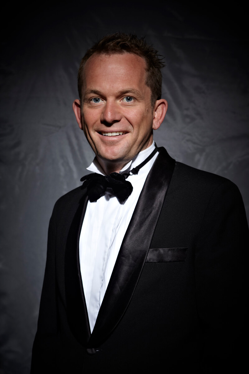 Jon Bode in formal performance attire